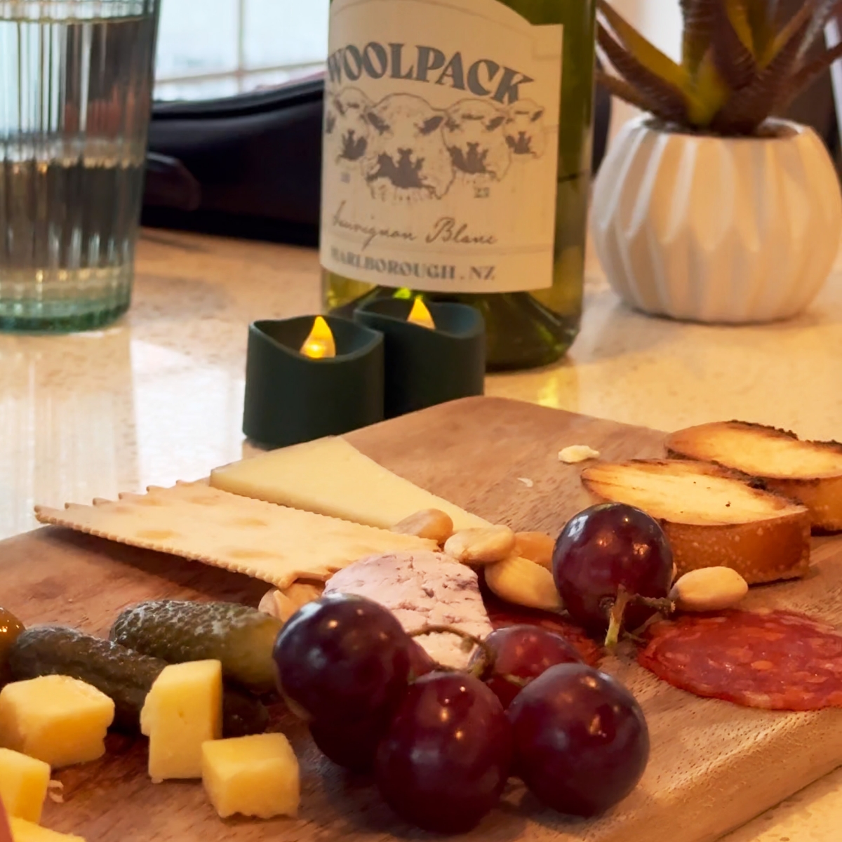 close up of wine and charcuterie